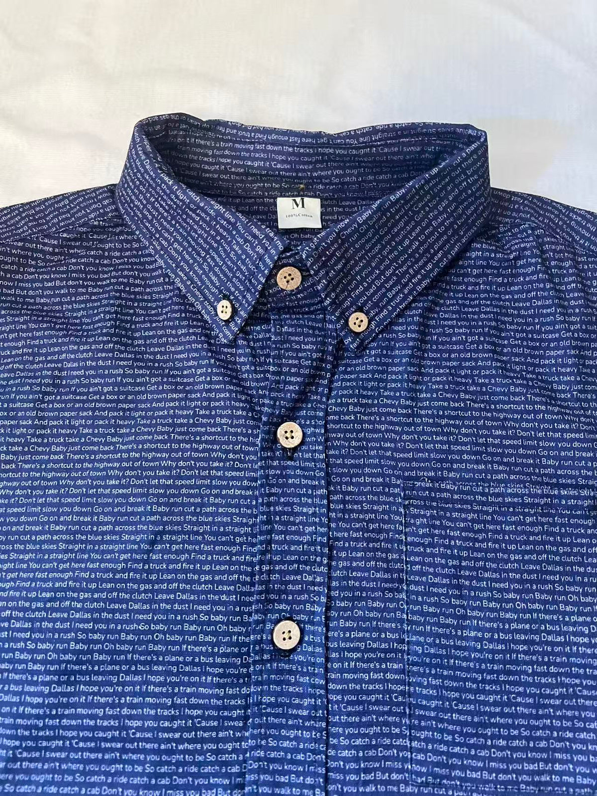 Classic buttondown shirt crafted from breathable cotton, tailored front placket and functional chest pocket for daily wear